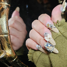 Load image into Gallery viewer, Elegant Nude Handmade Press-On Nails Adorned with Gold Accents and Sparkling Gem Embellishments.