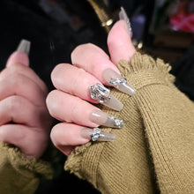 Load image into Gallery viewer, Stunning Handmade Long Press-On Nails with Glittery Silver Tips and Oversized Crystal Embellishments.