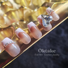 Load image into Gallery viewer, French Bliss Mid-Length T Press-On Nails with crystal embellishments and frosted tips.