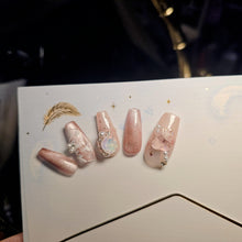 Load image into Gallery viewer, Set of reusable sparkling pink press-on nails with elegant embellishments
