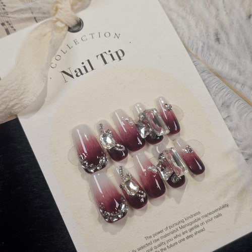 Bordeaux Elegance handmade ombre press-on nails with crystal embellishments.
