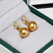 Load image into Gallery viewer, Golden Glow Elegance: 14mm Luminous Pearl Earring with Sparkling CZ Ear Hood
