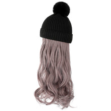 Load image into Gallery viewer, Model wearing the Chic Wool Hat with Detachable Hairpiece in a winter setting.
