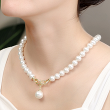 Load image into Gallery viewer, Elegant Luminescence: 10mm White Pearl &amp; CZ Bow Pendant Set - Gleaming Pearl Stud Earrings
