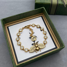 Load image into Gallery viewer, Gold-Tone Crystal Charm Bracelet with Bee Pendant | Chic Designer-Inspired

