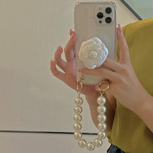 Load image into Gallery viewer, 3D Camellia iPhone Case with collapsible phone stand and Pearl Bracelet/Strap
