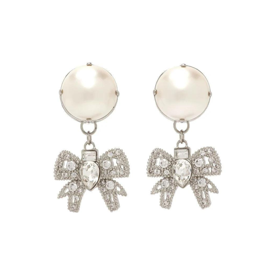 Platinum toned earrings with cute chic bows adorned with oversized resin pearls and white crystals
