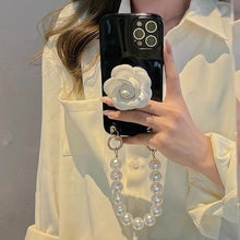 Load image into Gallery viewer, 3D Camellia iPhone Case with collapsible phone stand and Pearl Bracelet/Strap
